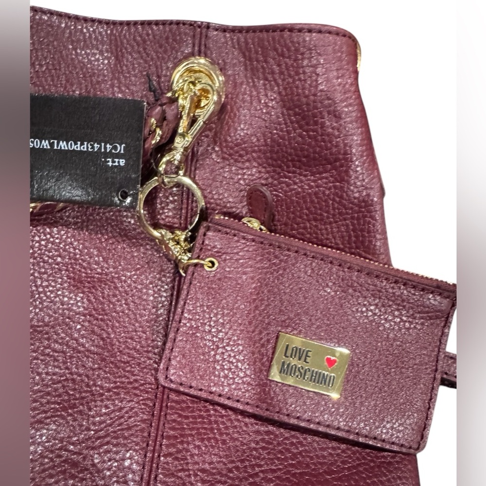 PRICE CUT !!!Brand new gorgeous Polinni Love Moschino maroon pebble leather bag.
